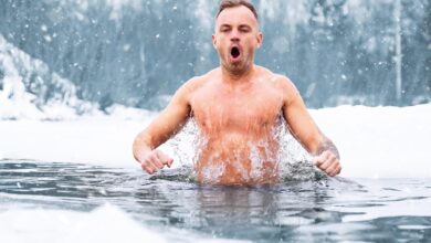 Young Man Cold Water Bath Outside